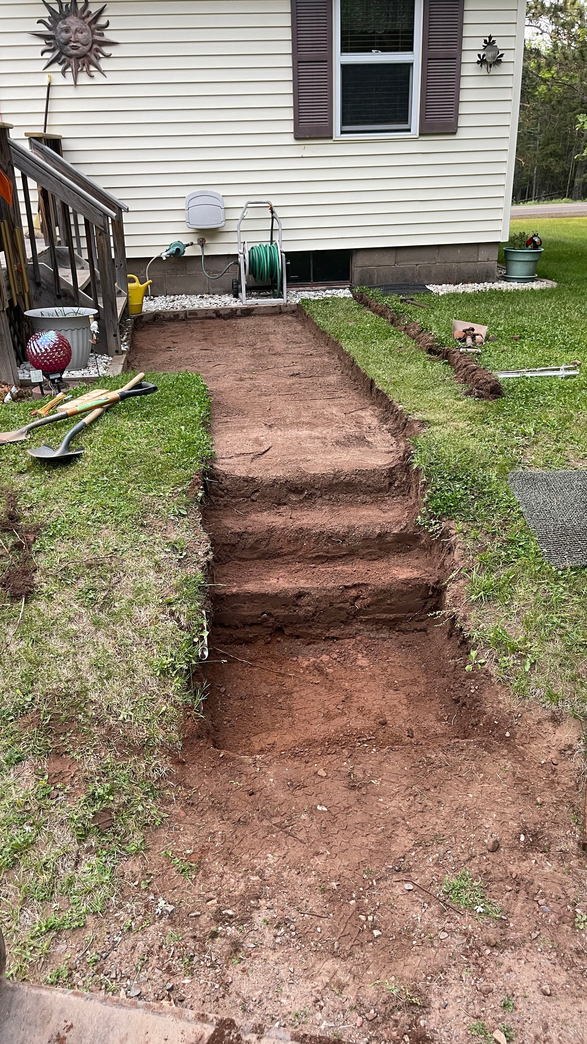 Paver Walkway Replaced With Concrete Sidewalk and Steps