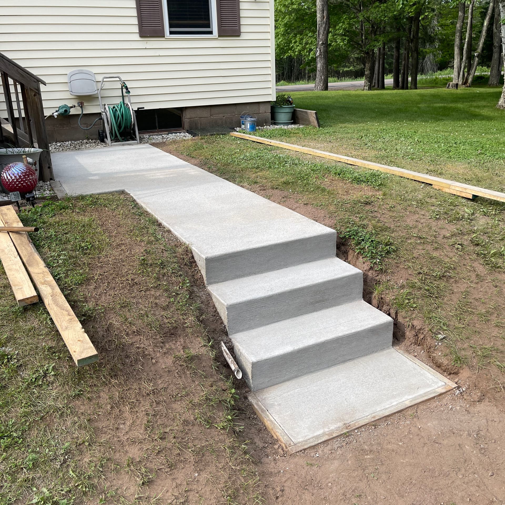 Paver Walkway Replaced With Concrete Sidewalk and Steps