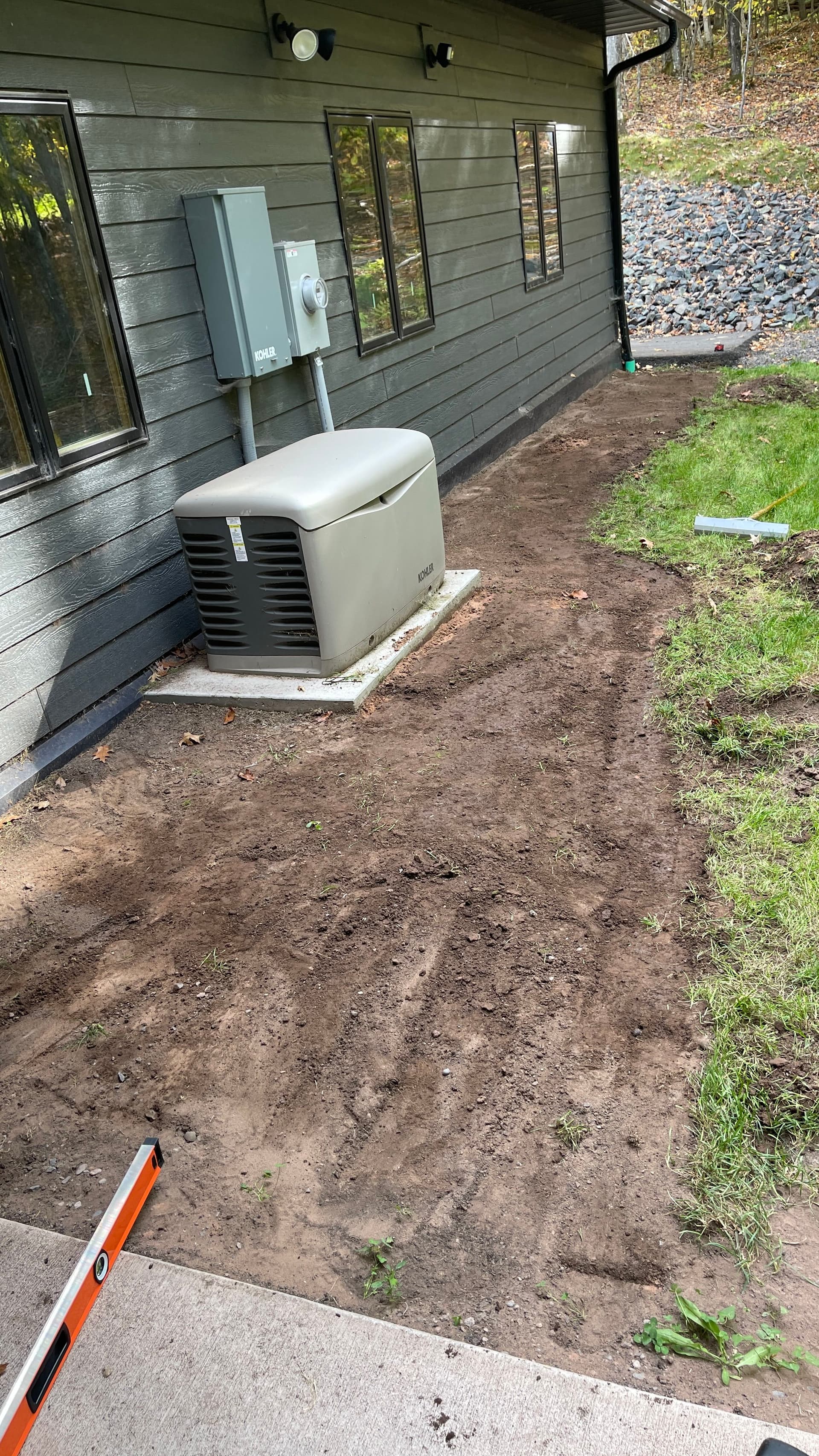 Concrete Patio and Sidewalk Pour Gives Homeowner a Clean Path
